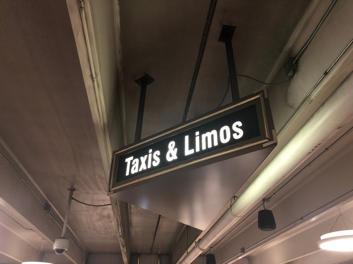 Taxis and limos sign